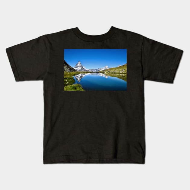 Matterhorn mirroring Swiss Alps / Swiss Artwork Photography Kids T-Shirt by RaphaelWolf